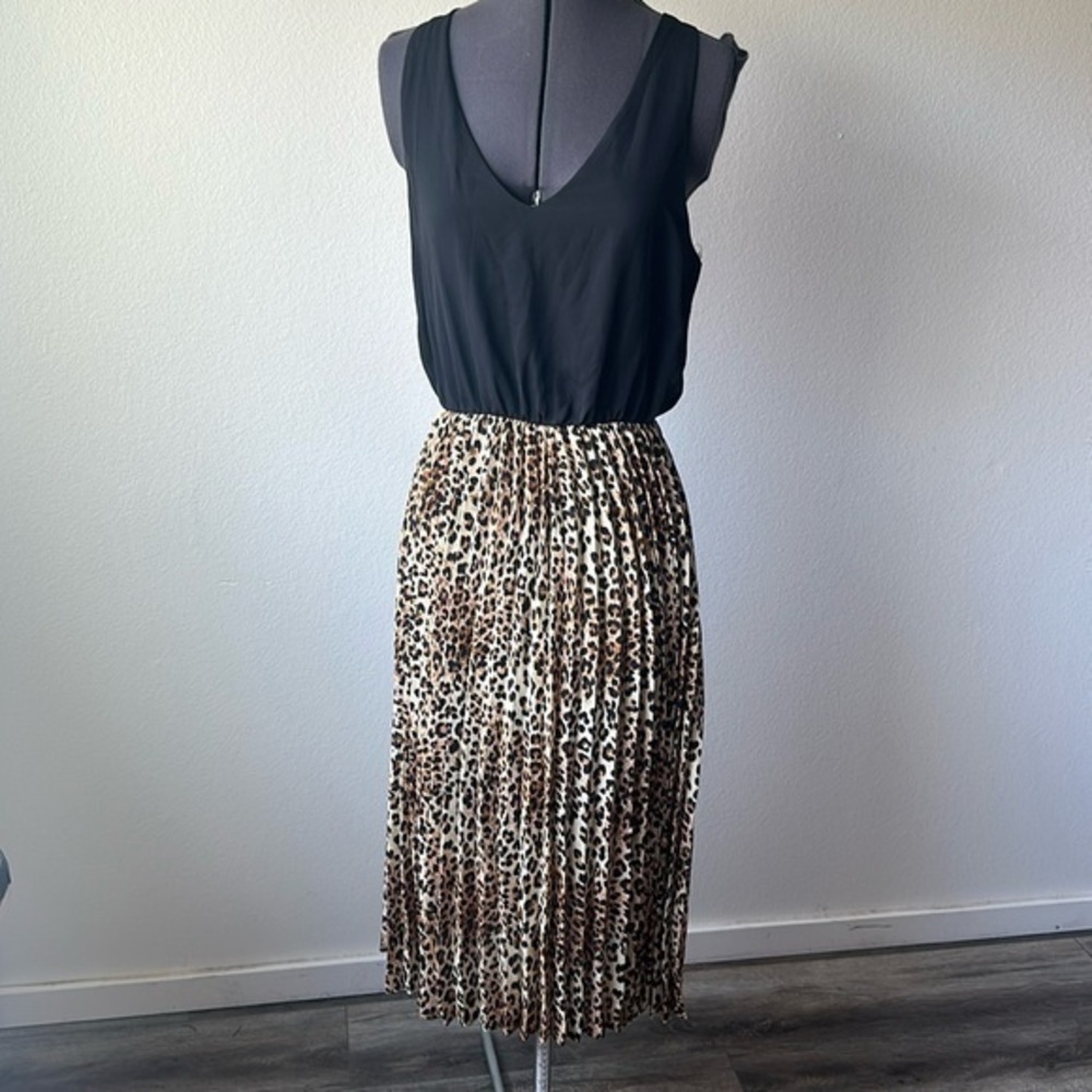 NWT Francesca’s collection dress cheetah , print & black size medium
